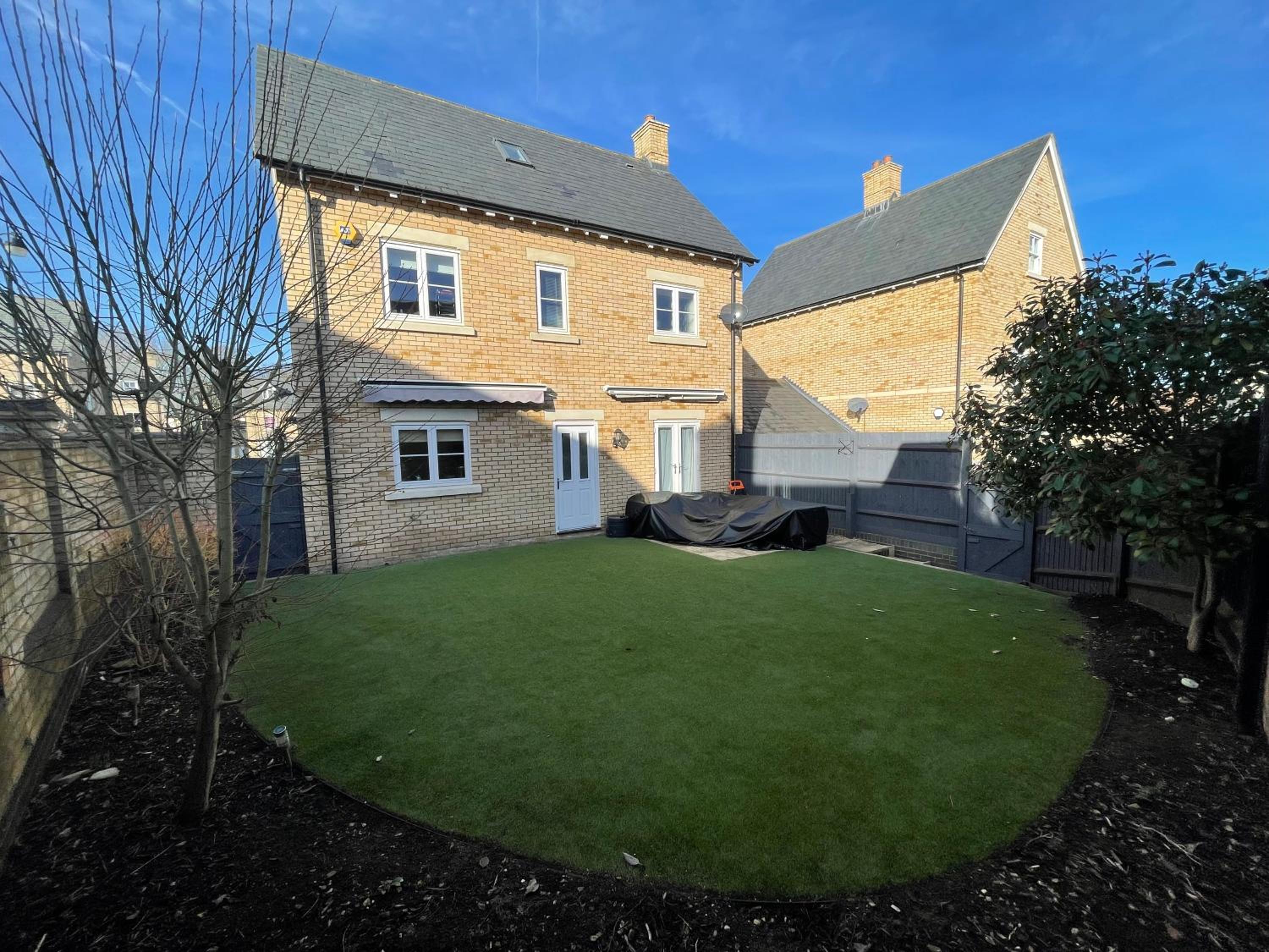 Detached family house with private garden.