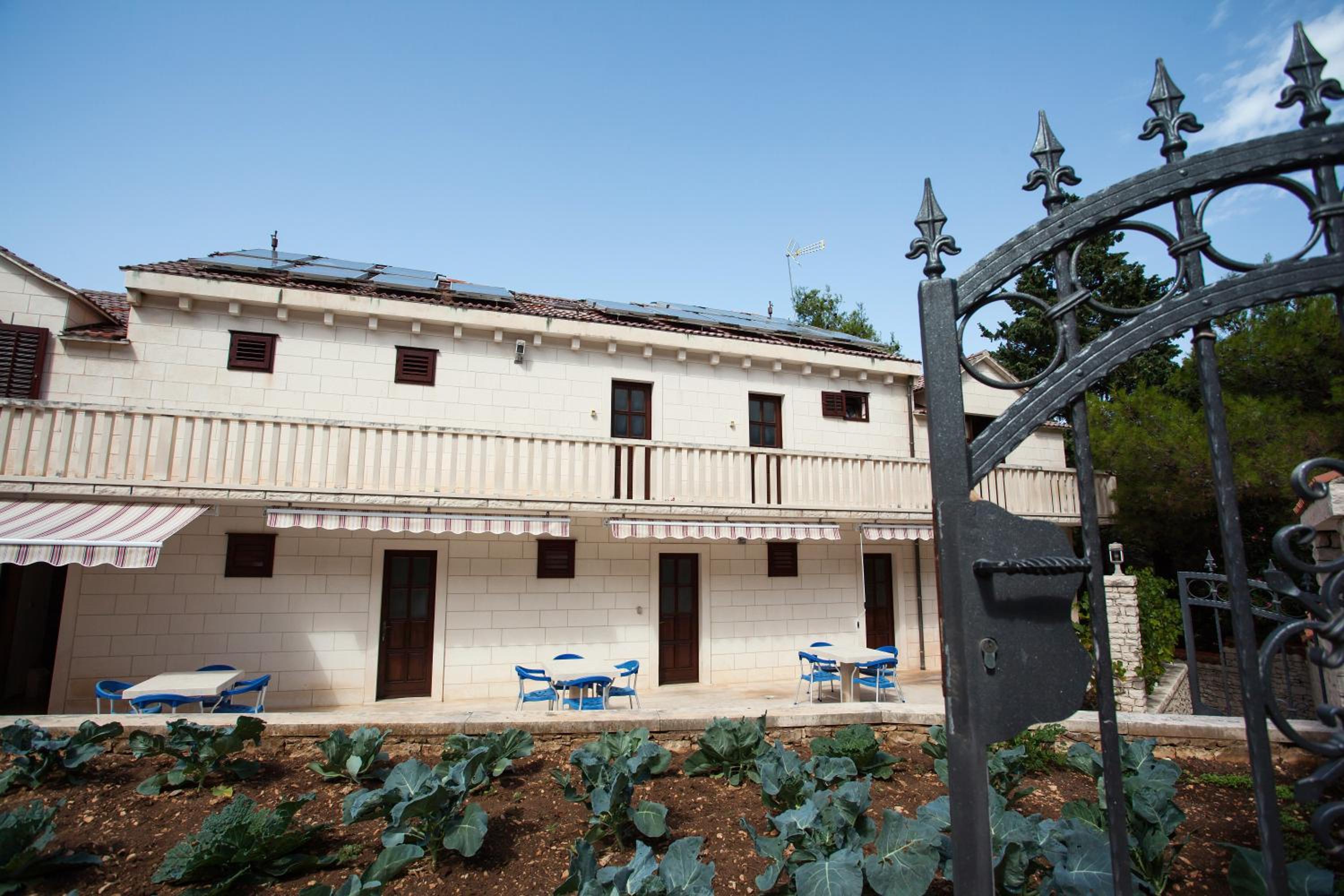 White house in the forest view 4