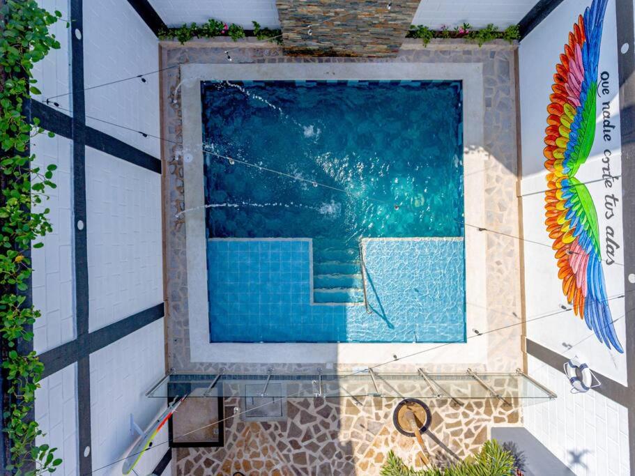 COZY, Apartamento a solo 10 minutos Caminando a Playa Dormida, con Piscina y Parqueadero.