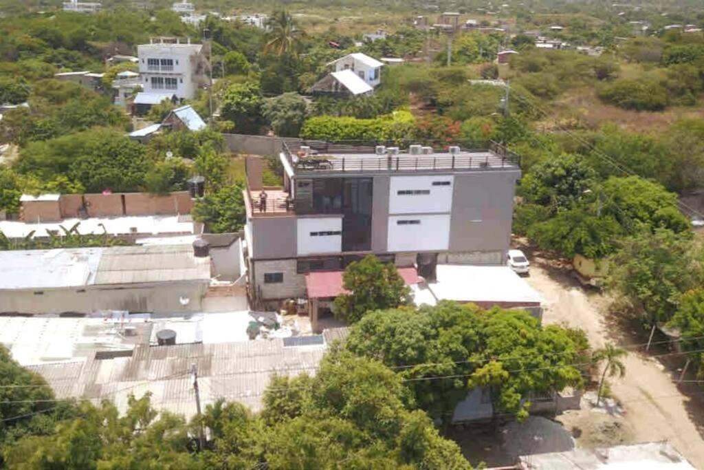 COZY, Apartamento a solo 10 minutos Caminando a Playa Dormida, con Piscina y Parqueadero.