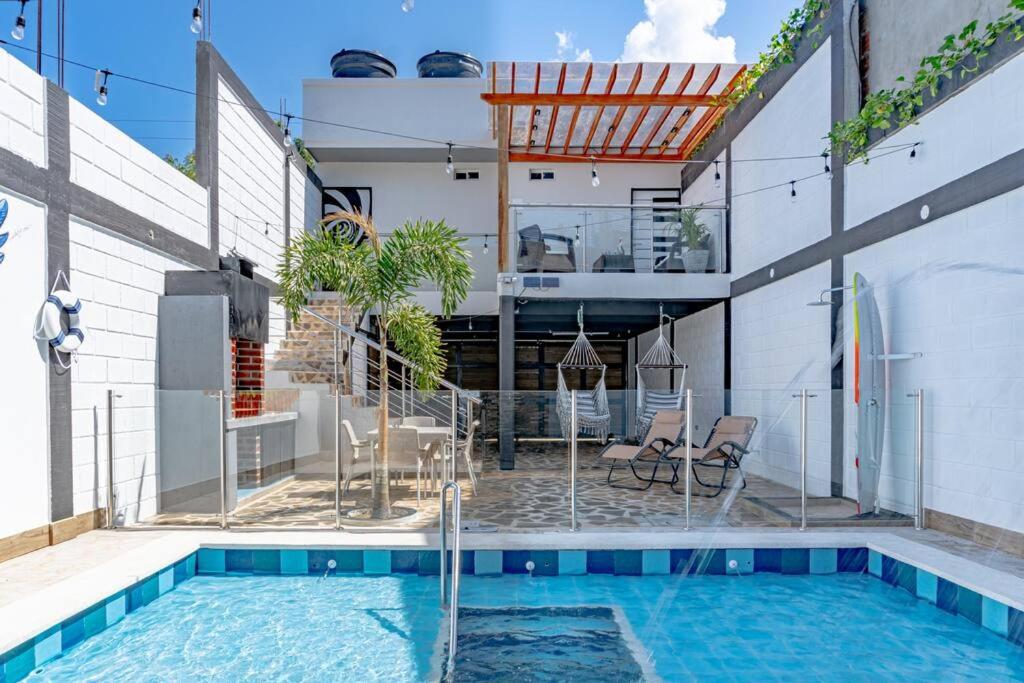 COZY, Apartamento a solo 10 minutos Caminando a Playa Dormida, con Piscina y Parqueadero.
