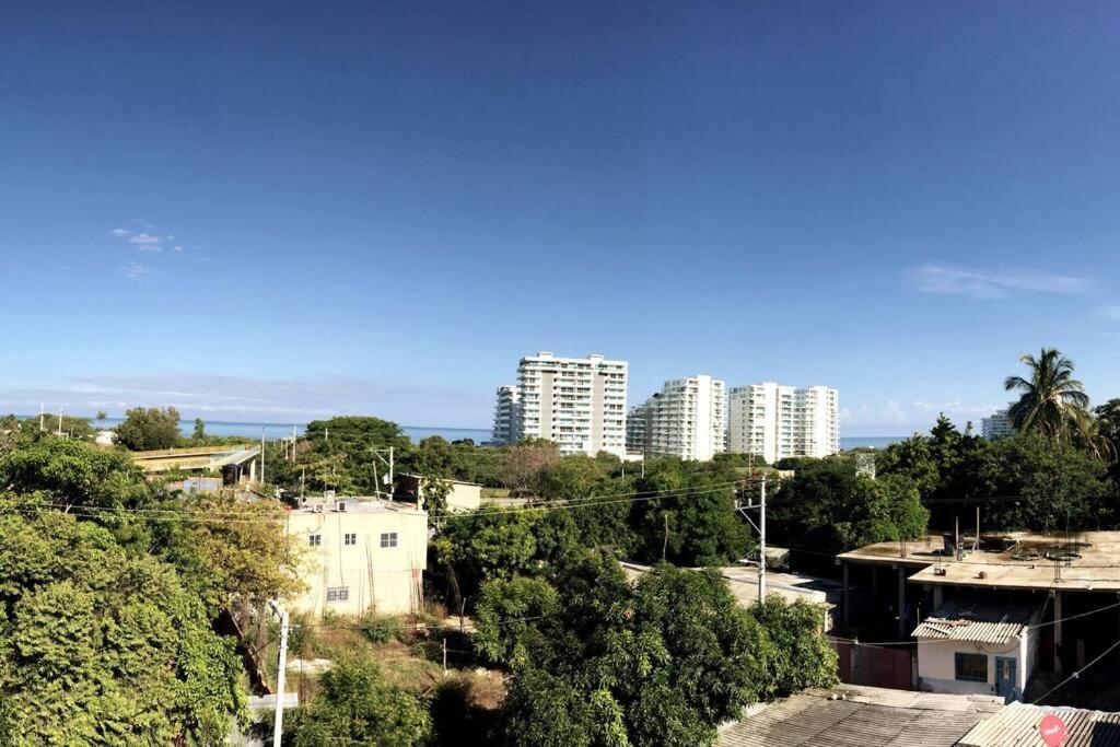 COZY, Apartamento a solo 10 minutos Caminando a Playa Dormida, con Piscina y Parqueadero.