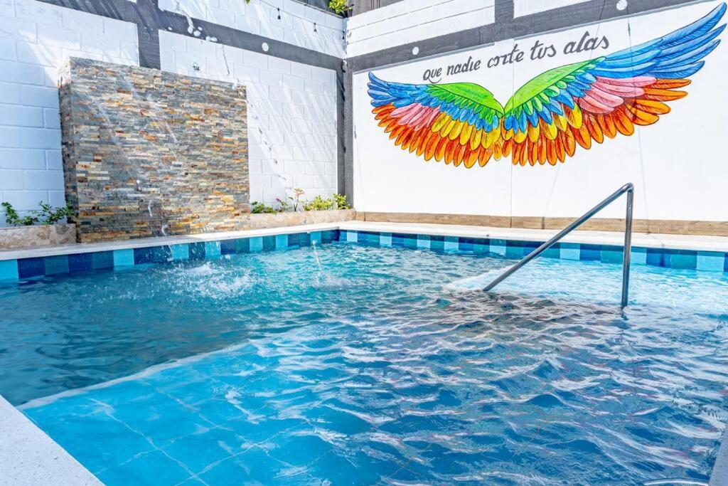 COZY, Apartamento a solo 10 minutos Caminando a Playa Dormida, con Piscina y Parqueadero.