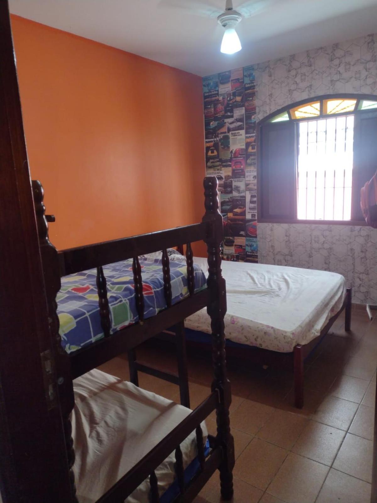Casa em Peruibe 3 dormitórios sendo 1 suite Pe na Areia