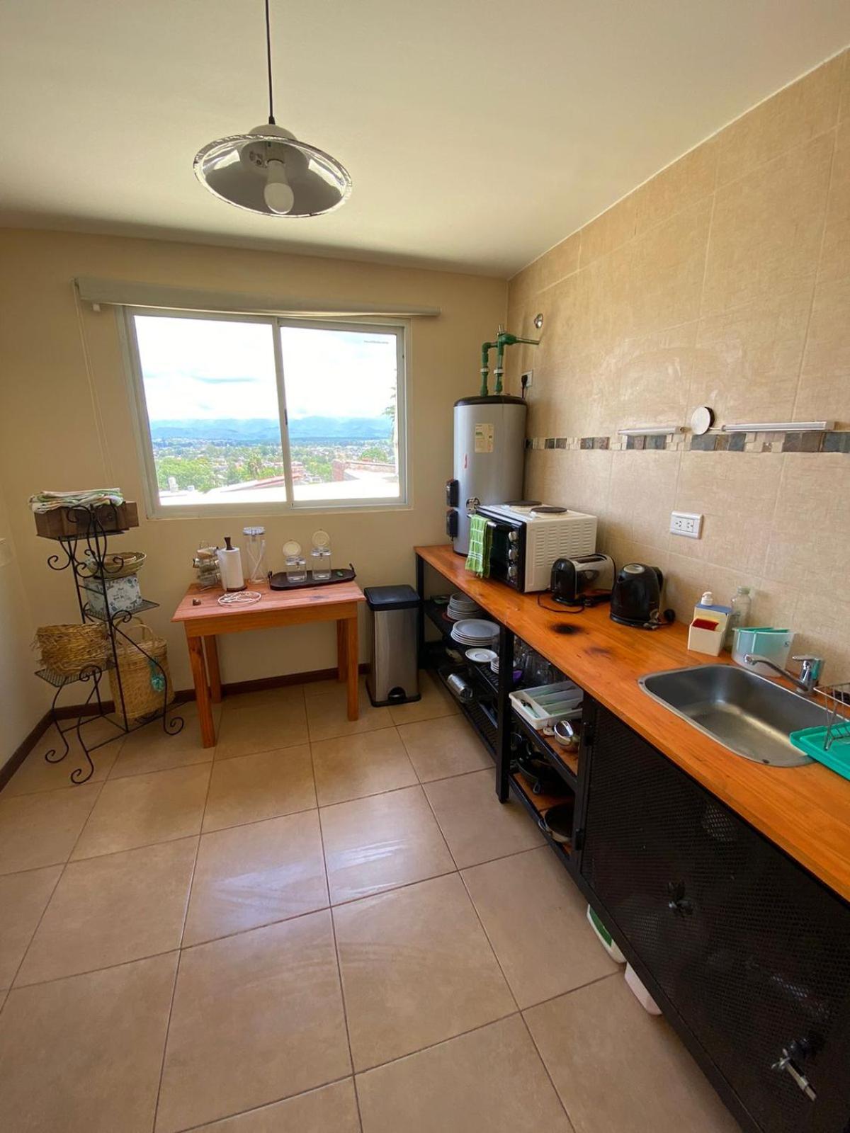 Departamento entre cerros y cielo