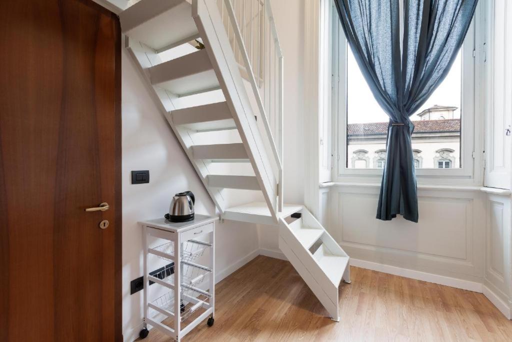 GuestHost - Central Studio APTS Milano-Corso Magenta