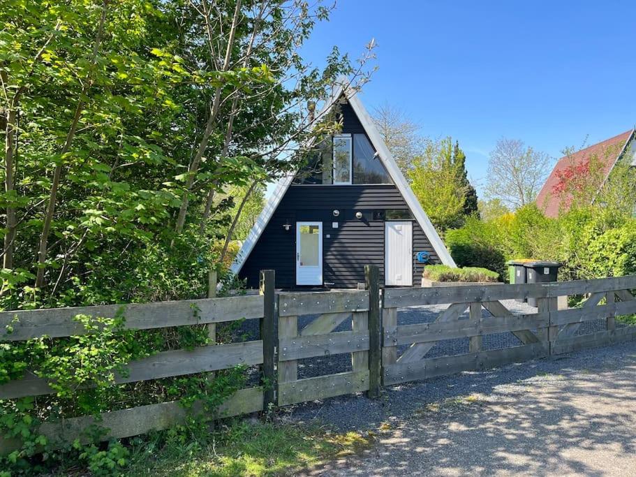 Achthoek 51, Nieuw ingericht vrijstaand vakantiehuis op 920m2 view 3