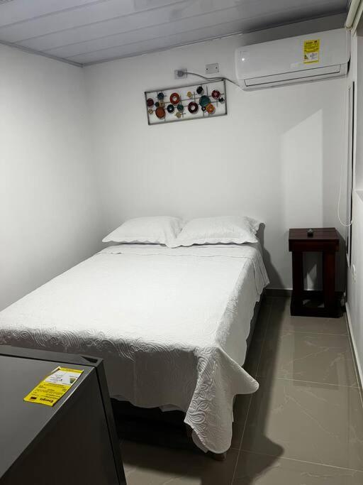 Habitación confortable y terraza Hamacas Coveñas