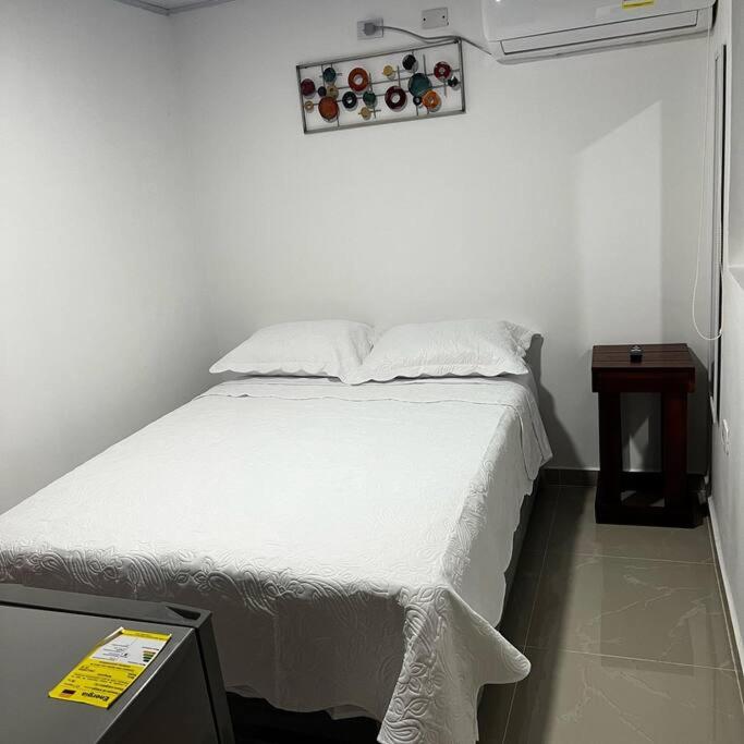 Habitación confortable y terraza Hamacas Coveñas
