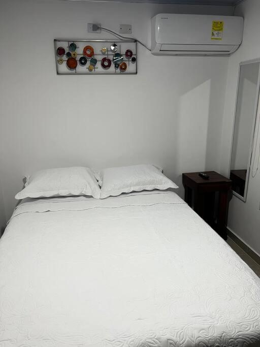 Habitación confortable y terraza Hamacas Coveñas
