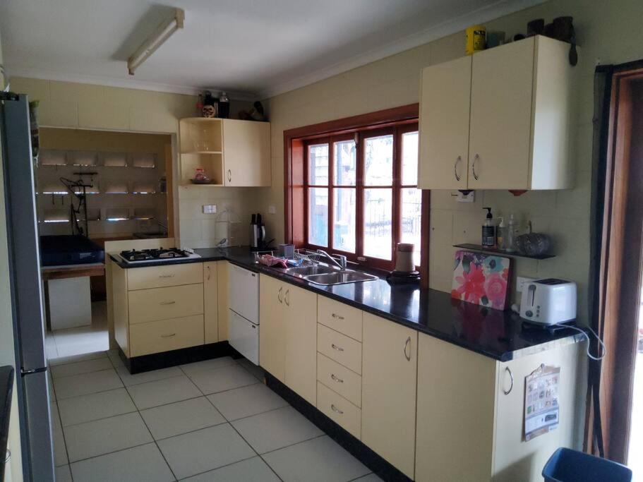 Downstairs only. 3 Queen BR with private access.