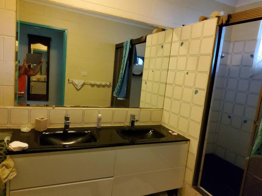 Downstairs only. 3 Queen BR with private access.