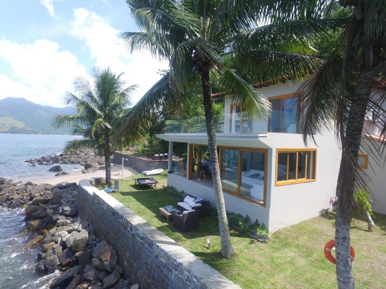 Casa com praia particular no condomínio Portobello