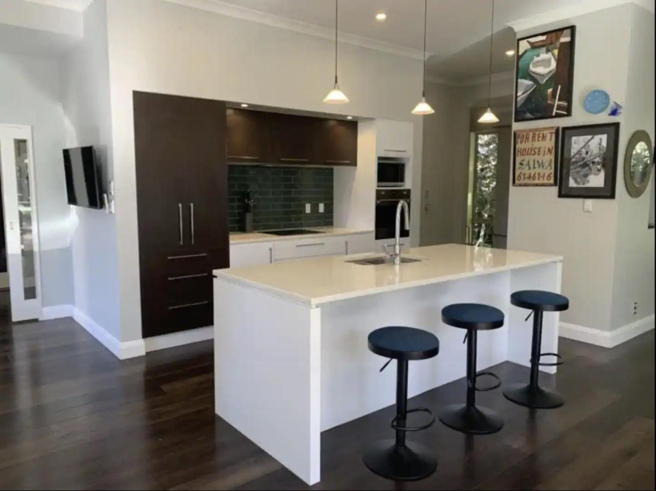 Luxurious 5 Bedroom home with heated pool view 3