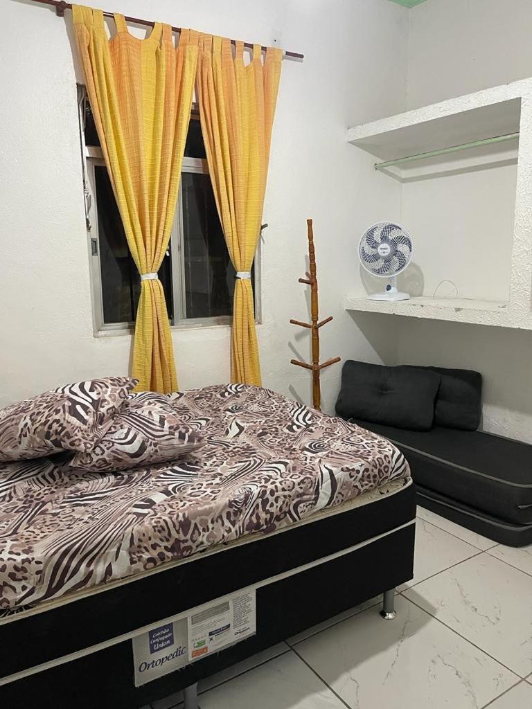 Casa térrea a 2 min da praia dos anjos