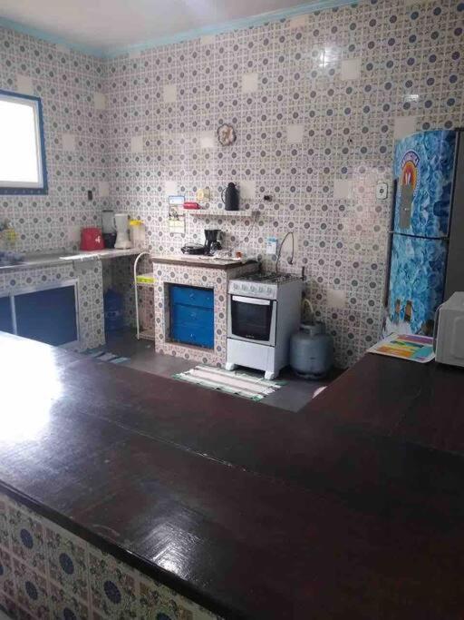 Casa térrea a 2 min da praia dos anjos