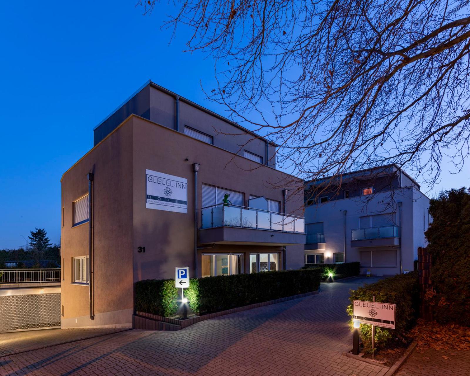 Hotel GLEUEL INN - digital hotel & serviced apartments & boardinghouse mit voll ausgestatteten Küchen - Image 1