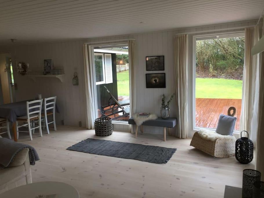En perle af et sommerhus tæt på både strand og by view 5