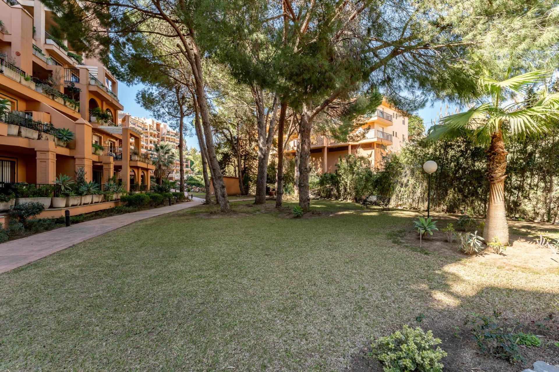 Seaside Bliss 2BR Apartment with Tranquil Terrace Pool and Parking