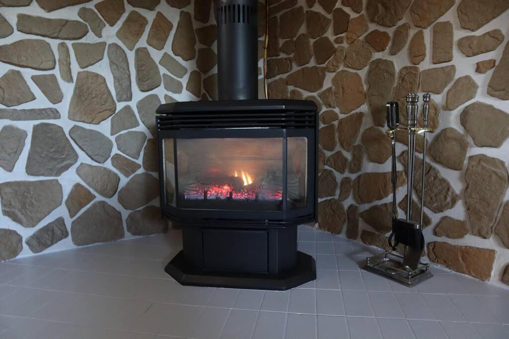 Private trendy studio with fireplace