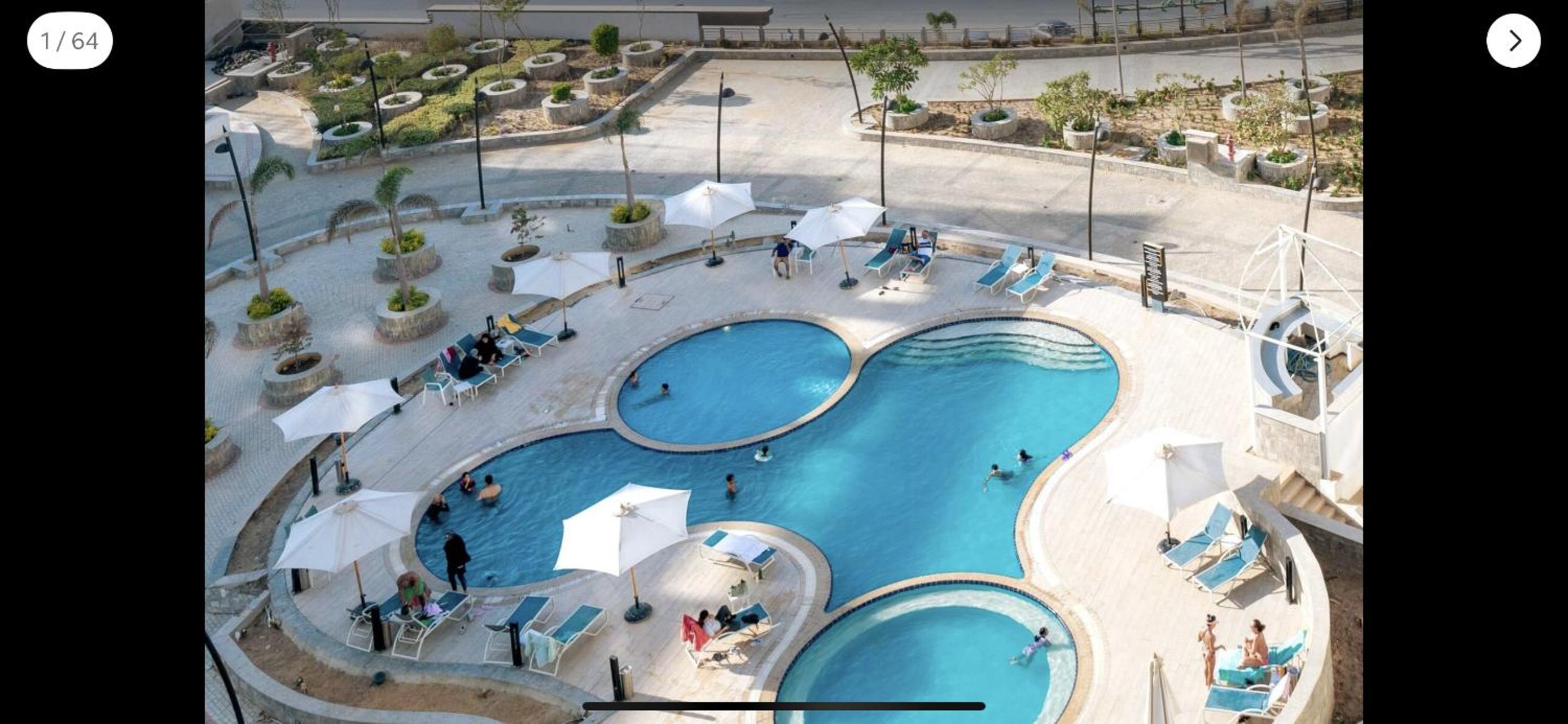 Luxury hotel apartment with pools in front AUC