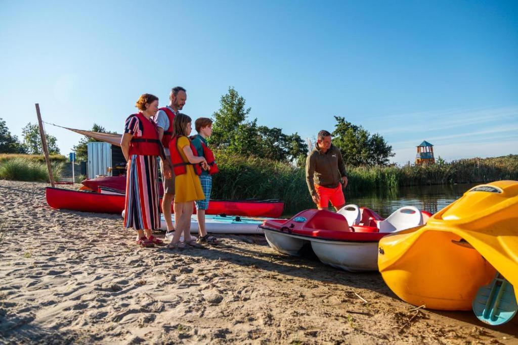 Tiny vakantiehuis aan het water met eigen steiger en airco