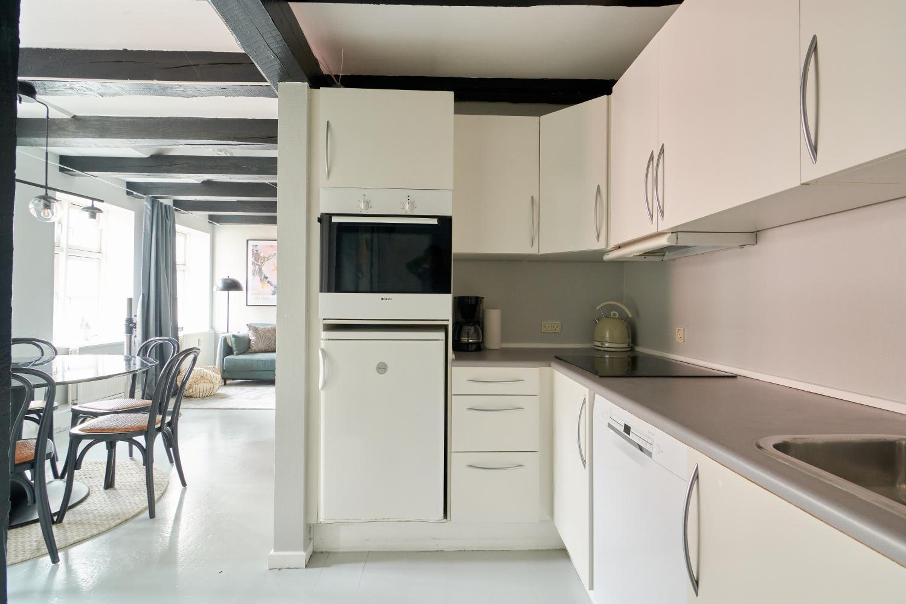 Unique 2 Bedroom Duplex w Exposed Beams in CPH City view 3
