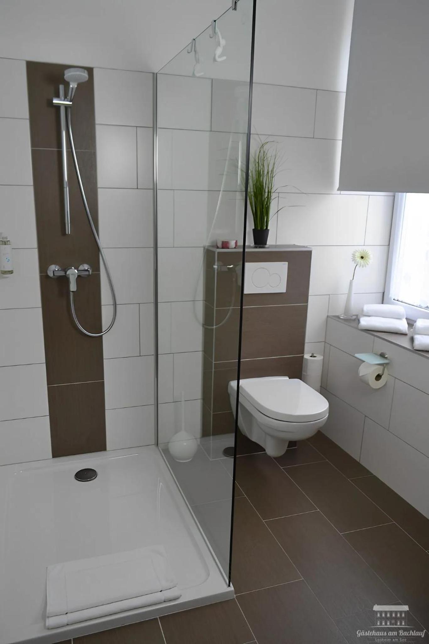 Komfort Ferienwohnungen mit Wellness-Garten - Gästehaus am Bachlauf - Losheim am See