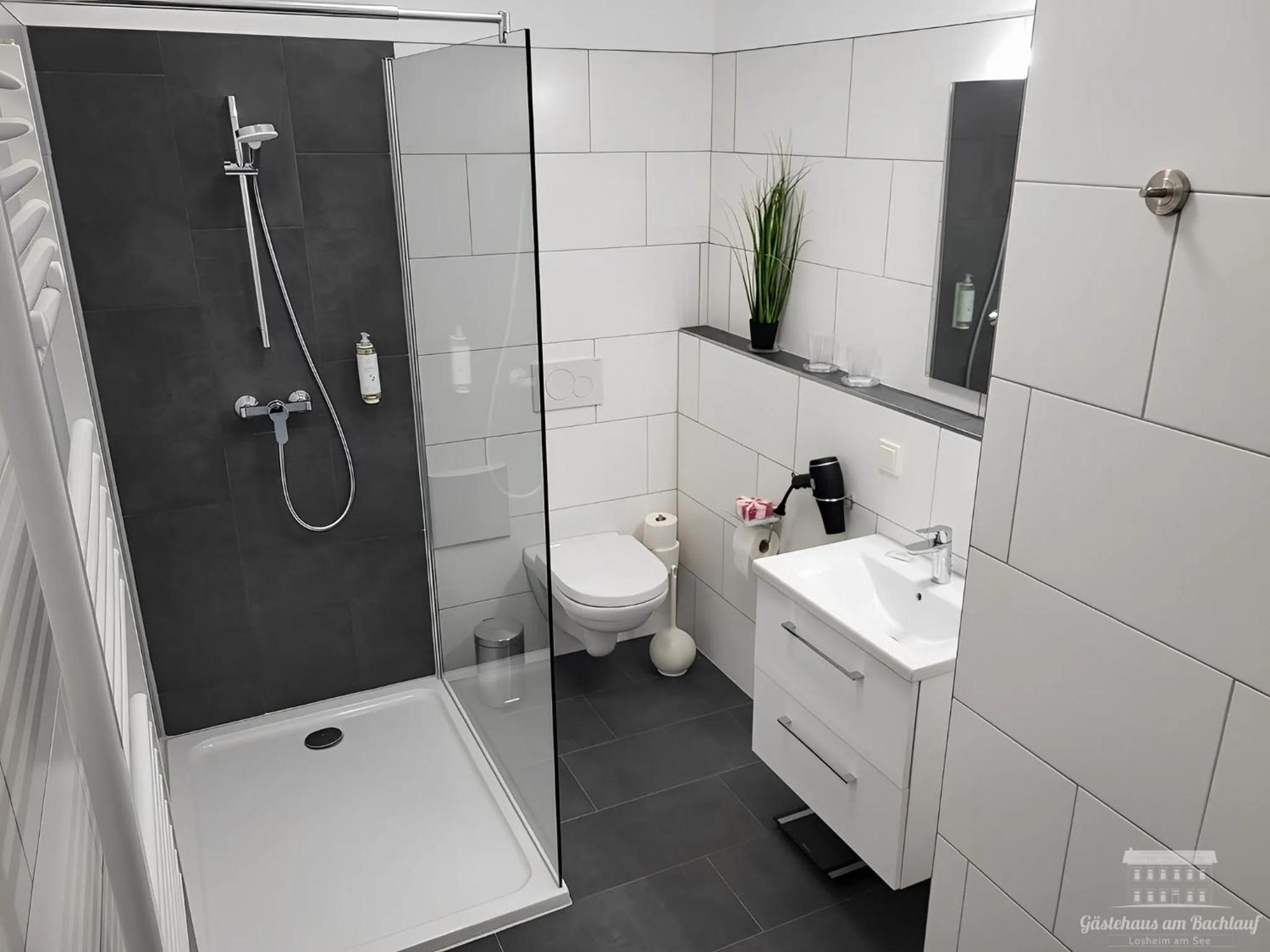 Komfort Ferienwohnungen mit Wellness-Garten - Gästehaus am Bachlauf - Losheim am See