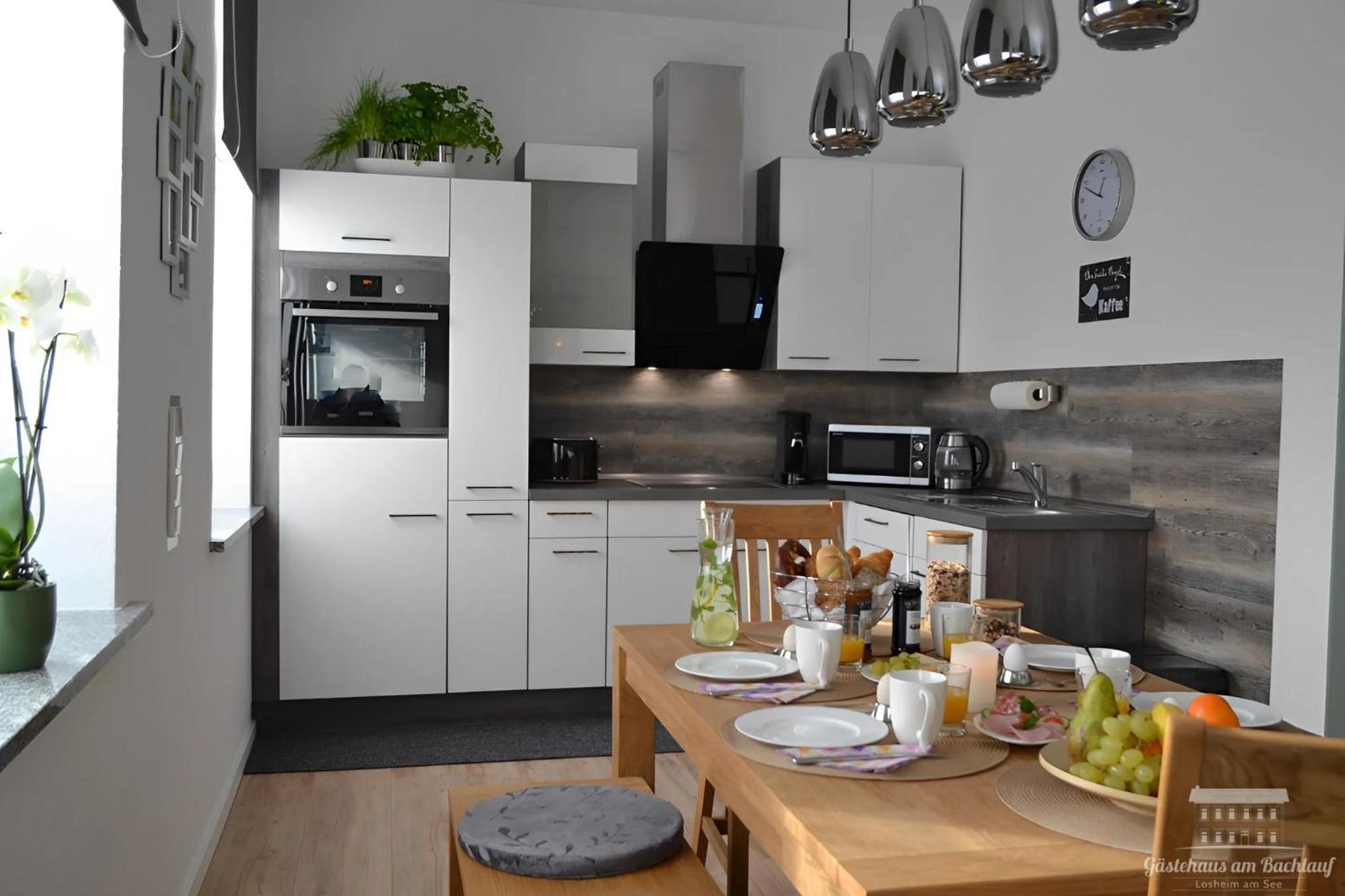 Komfort Ferienwohnungen mit Wellness-Garten - Gästehaus am Bachlauf - Losheim am See