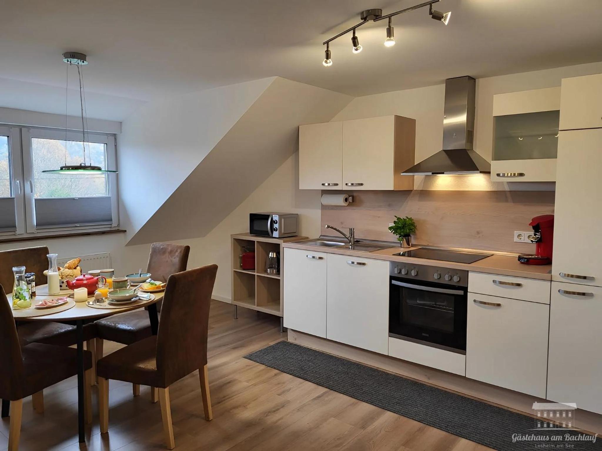 Komfort Ferienwohnungen mit Wellness-Garten - Gästehaus am Bachlauf - Losheim am See
