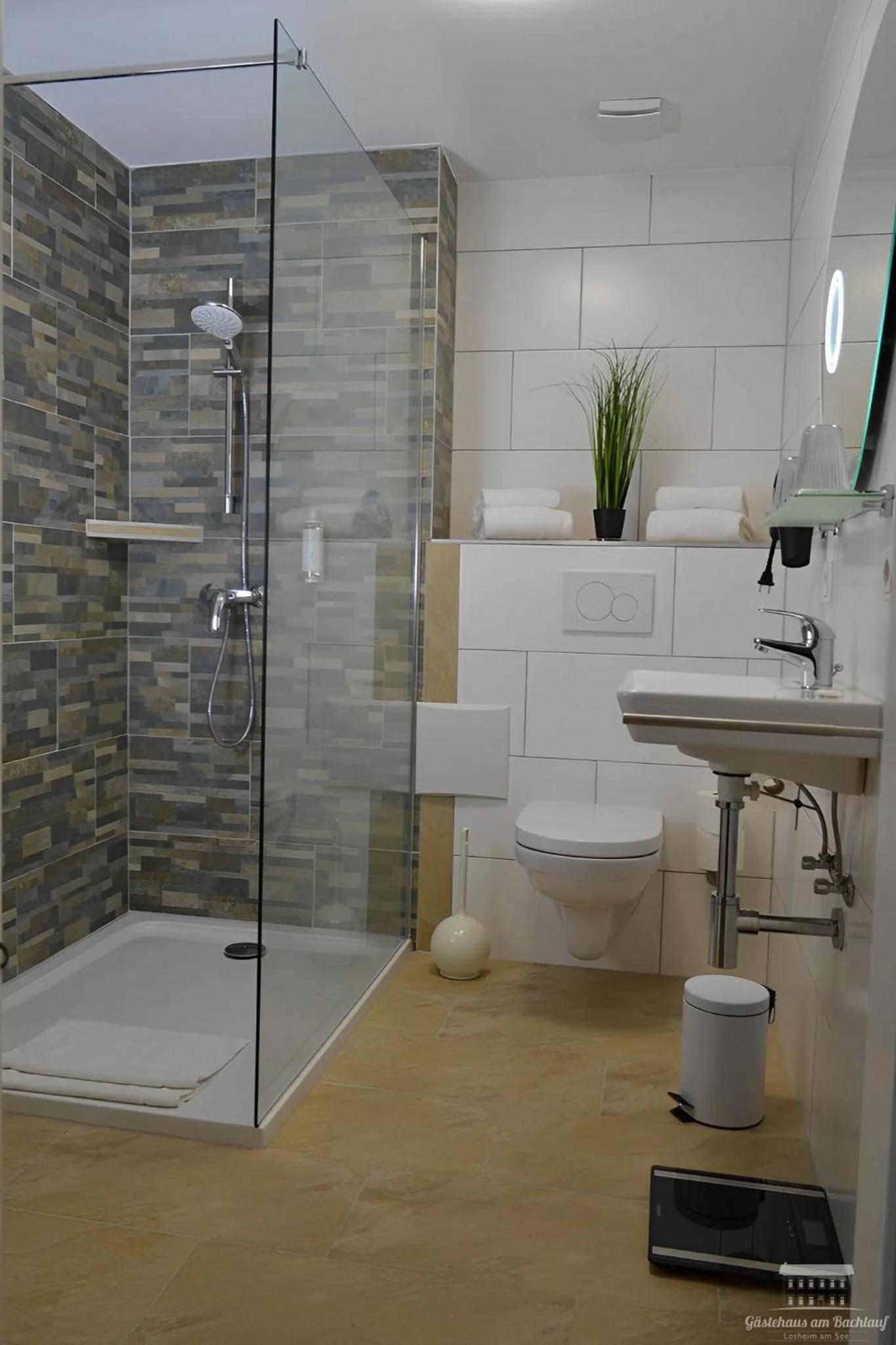 Komfort Ferienwohnungen mit Wellness-Garten - Gästehaus am Bachlauf - Losheim am See