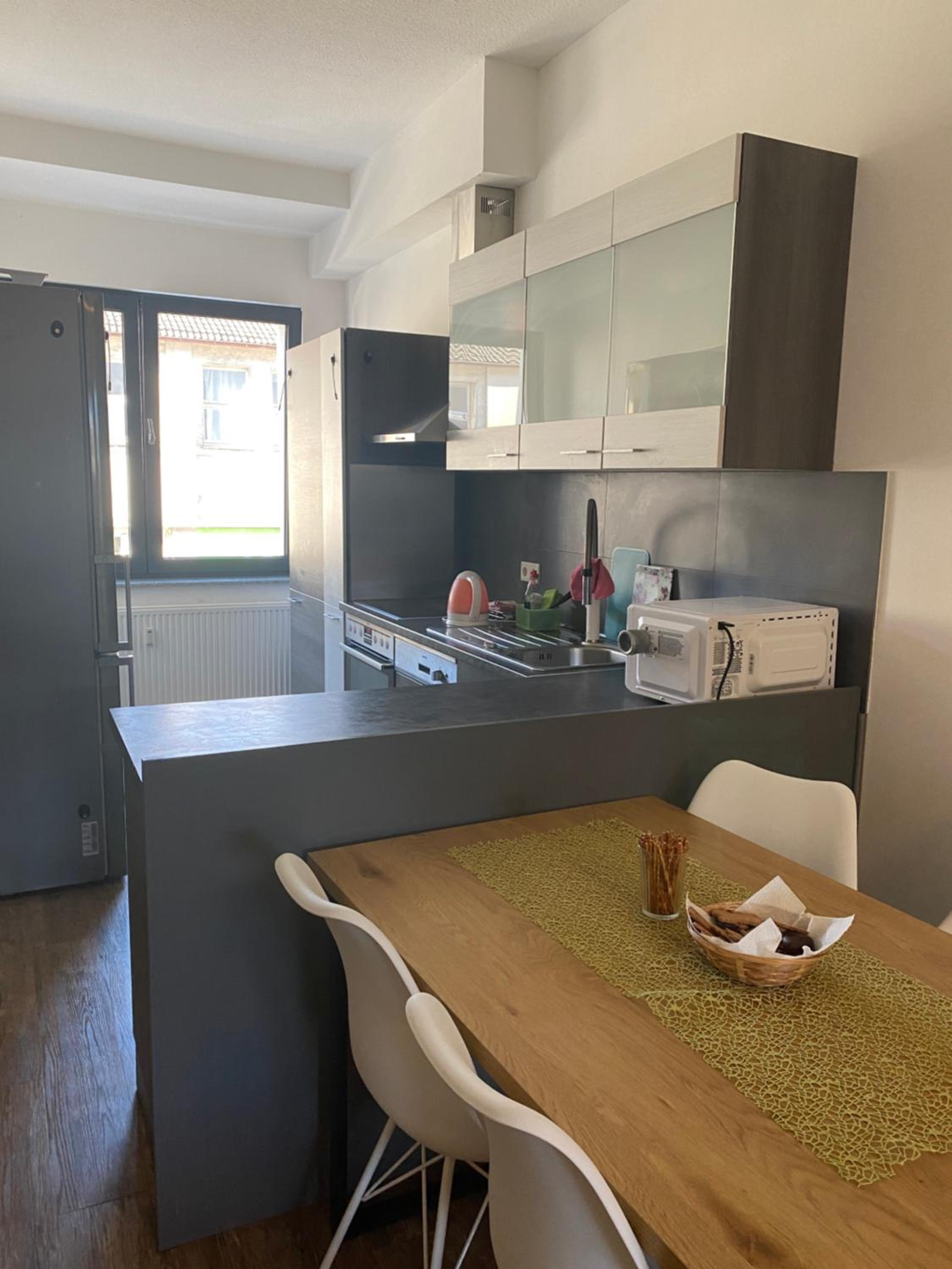 BIELEFELD CITY APARTMENTS - komfortable Einzelzimmer und Doppelzimmer - moderne Badezimmer, schnelles WLAN, Self-Check-In
