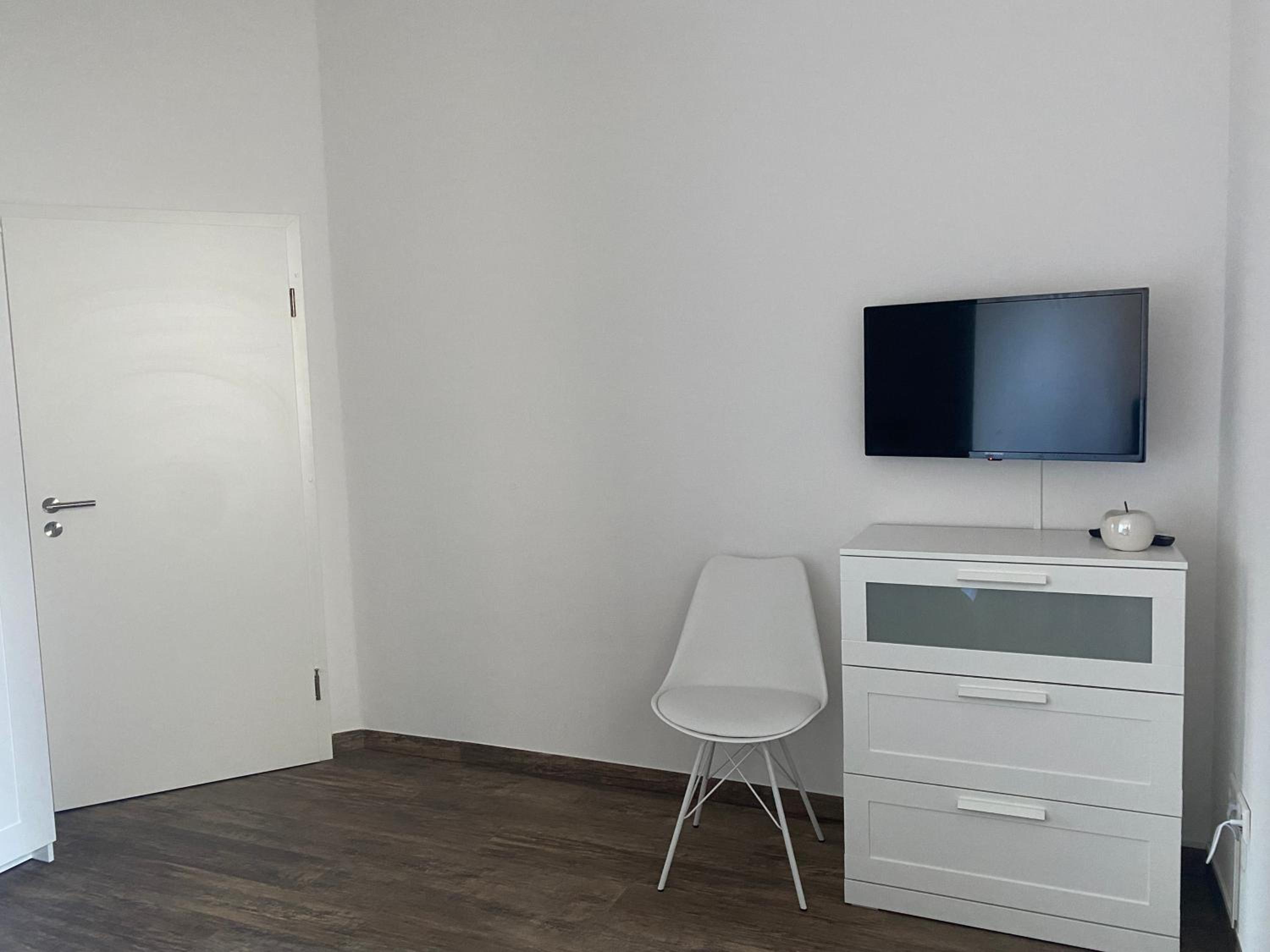BIELEFELD CITY APARTMENTS - komfortable Einzelzimmer und Doppelzimmer - moderne Badezimmer, schnelles WLAN, Self-Check-In