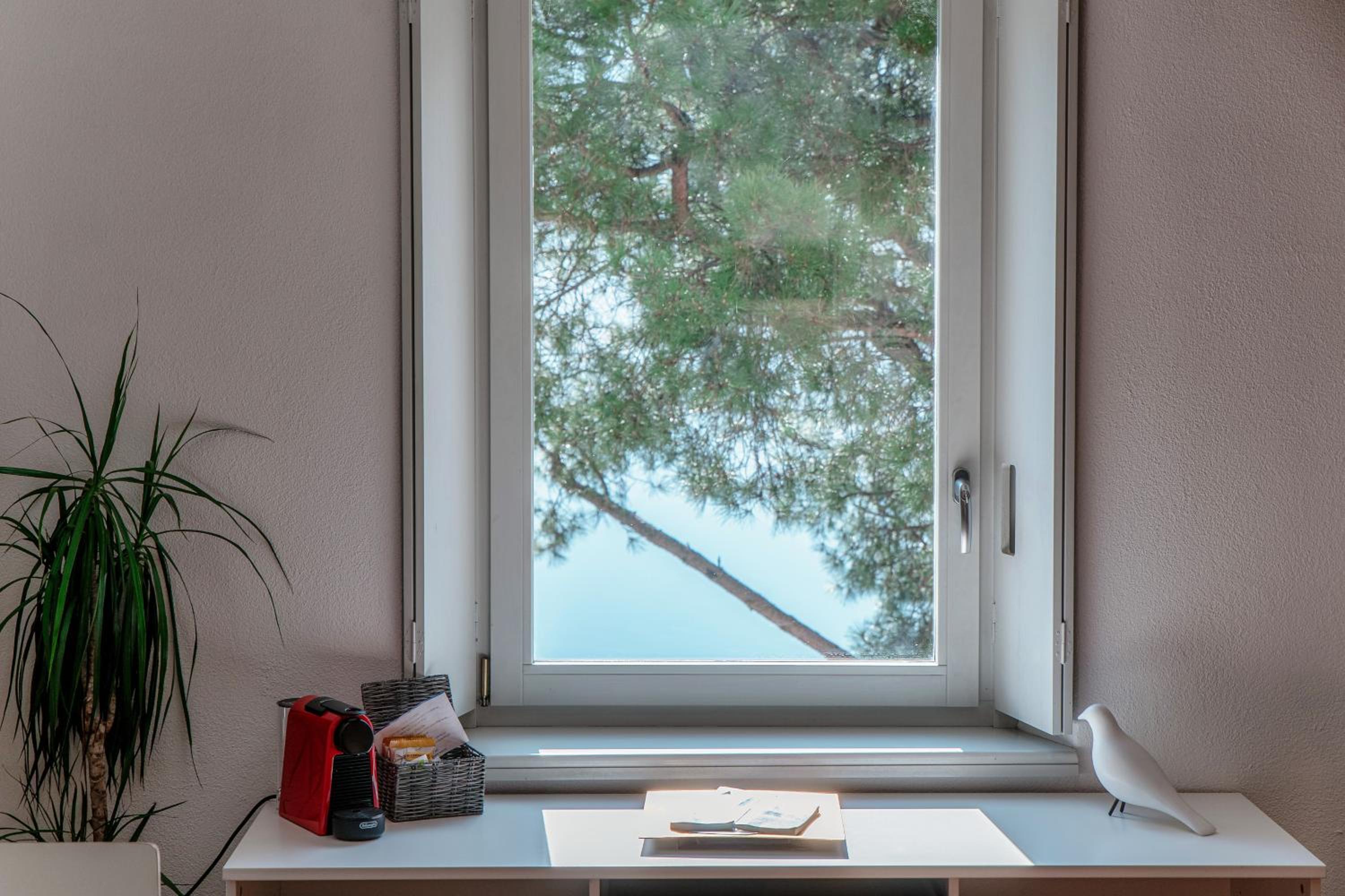 SIN4 Apartments by Quokka 360 - overlooking the lake - FAI heritage in Morcote