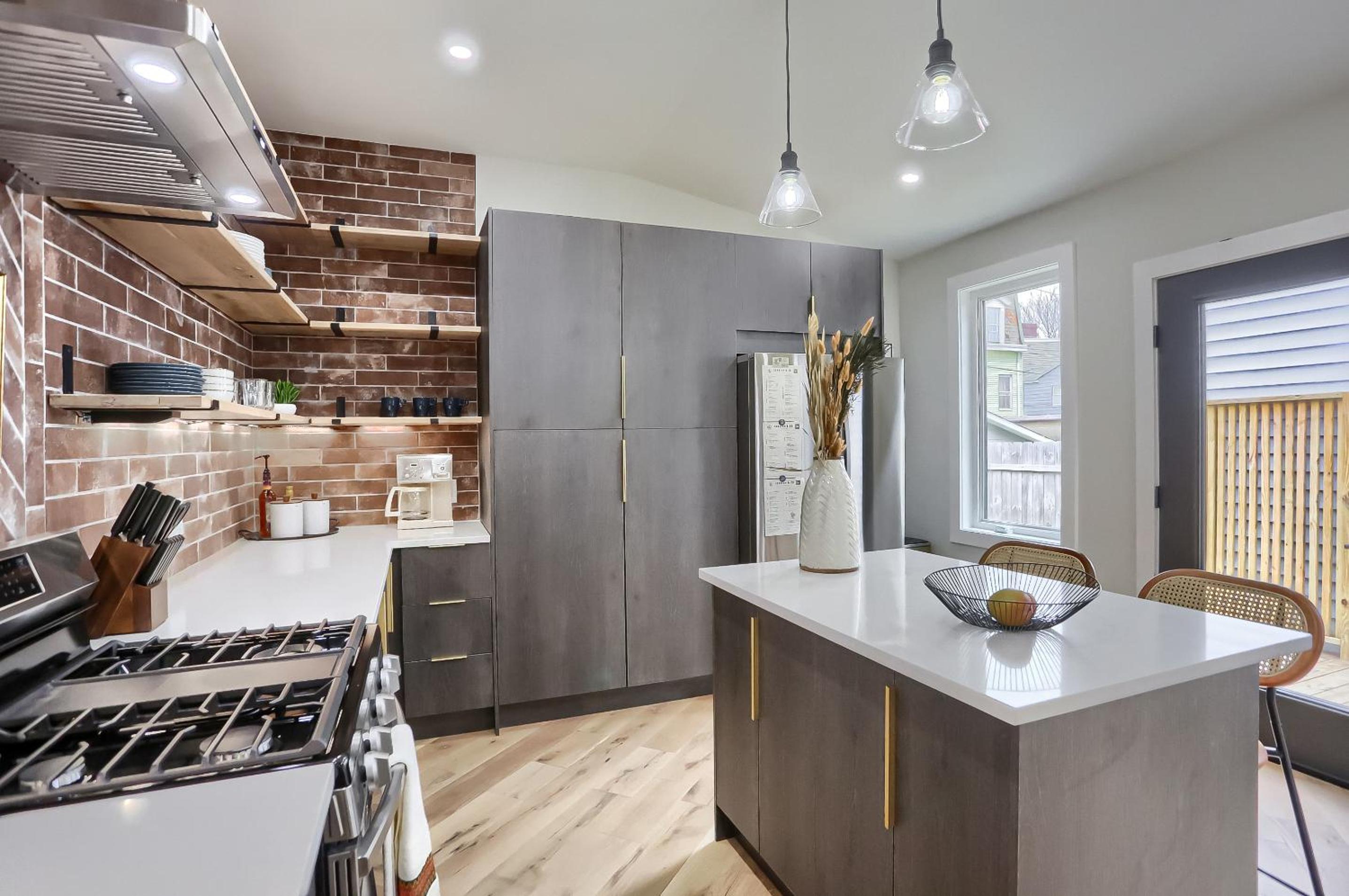 Urban Oasis Retreat With Luxury Design, Hot Tub, Fire Pit, Breathtaking Downtown & River Views view 5