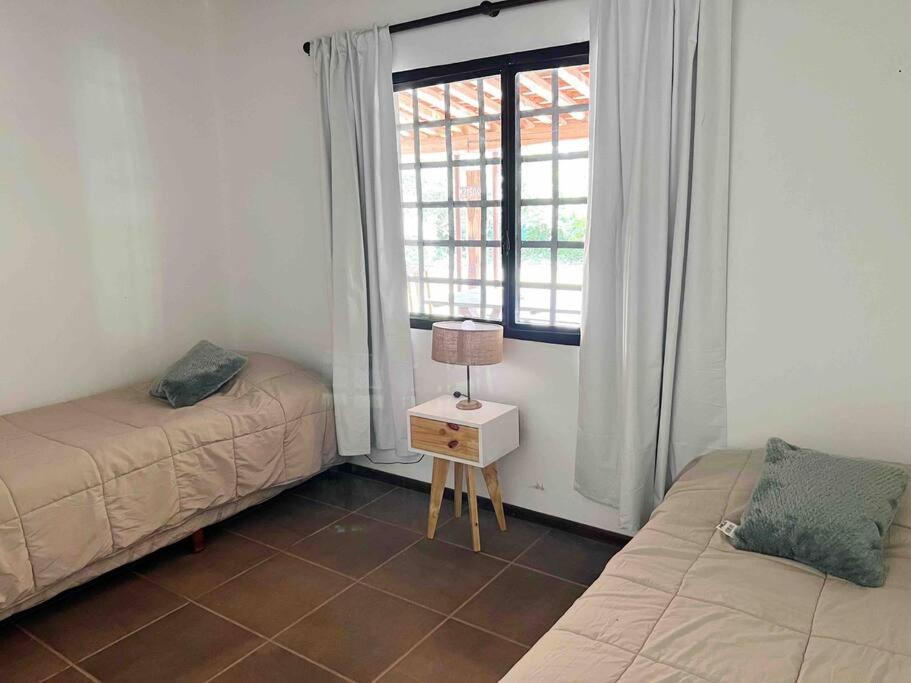 Casa en callejón privado en Chacras de Coria con bicicleta