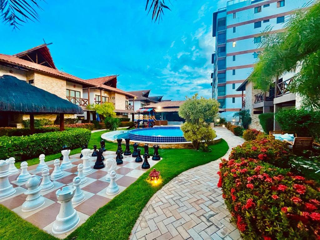 Bangalô com área de lazer estilo resort