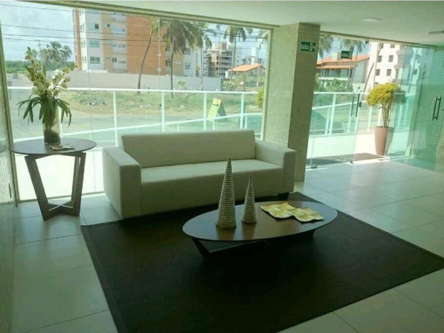 Flat Bello Plaza - piscina com vista da orla