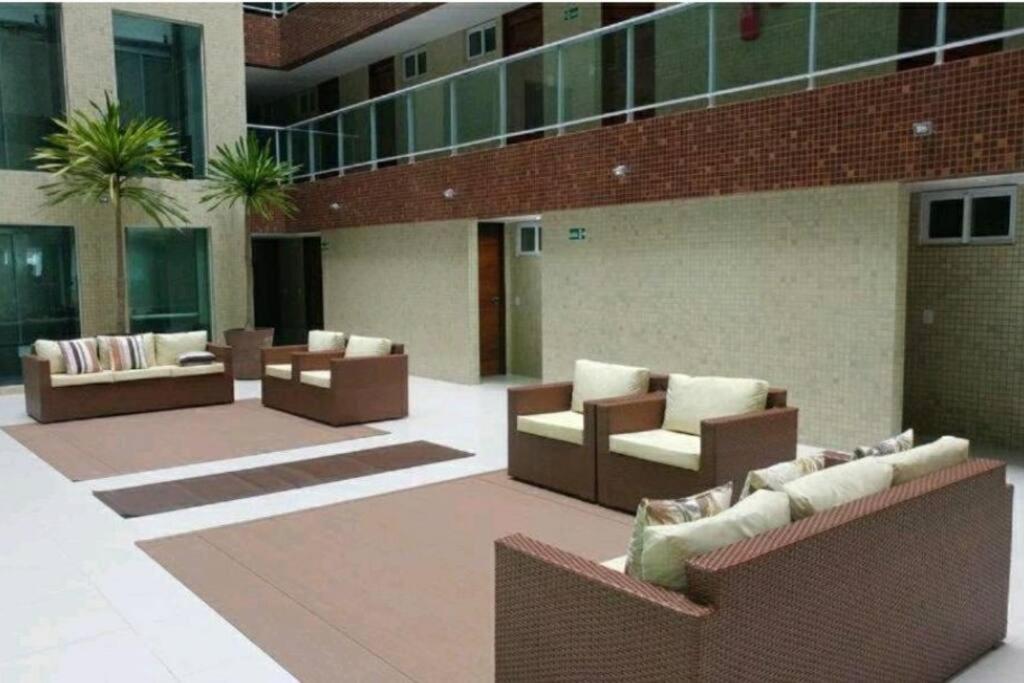 Flat Bello Plaza - piscina com vista da orla