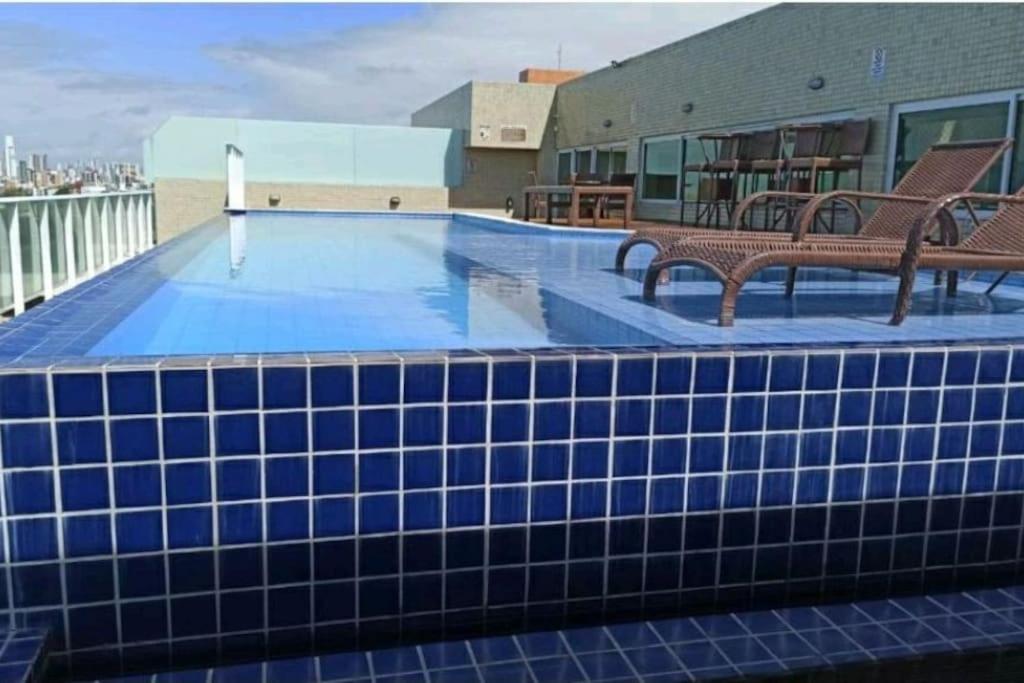 Flat Bello Plaza - piscina com vista da orla