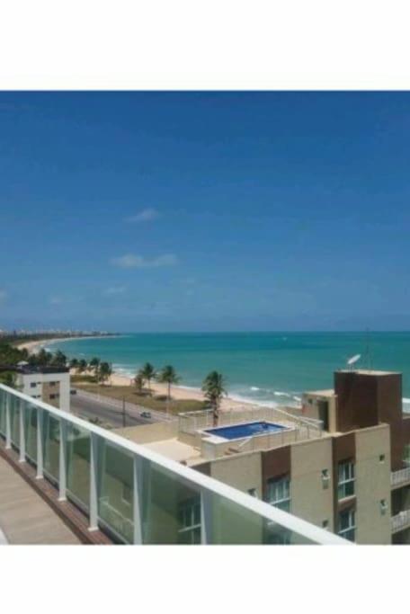 Flat Bello Plaza - piscina com vista da orla