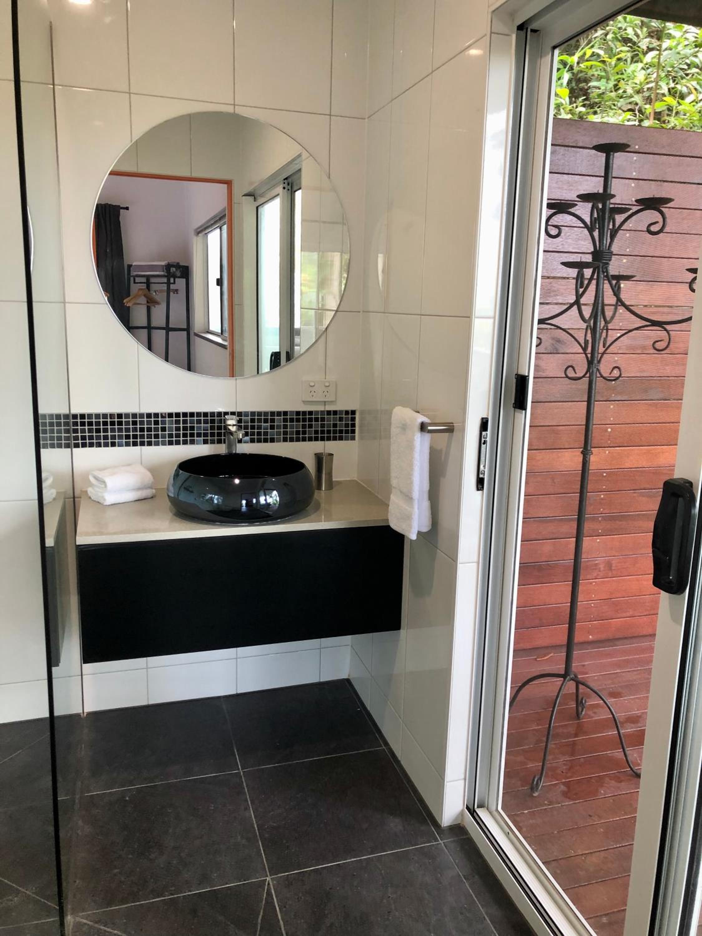 Sky: rainforest and ocean views with jacuzzi