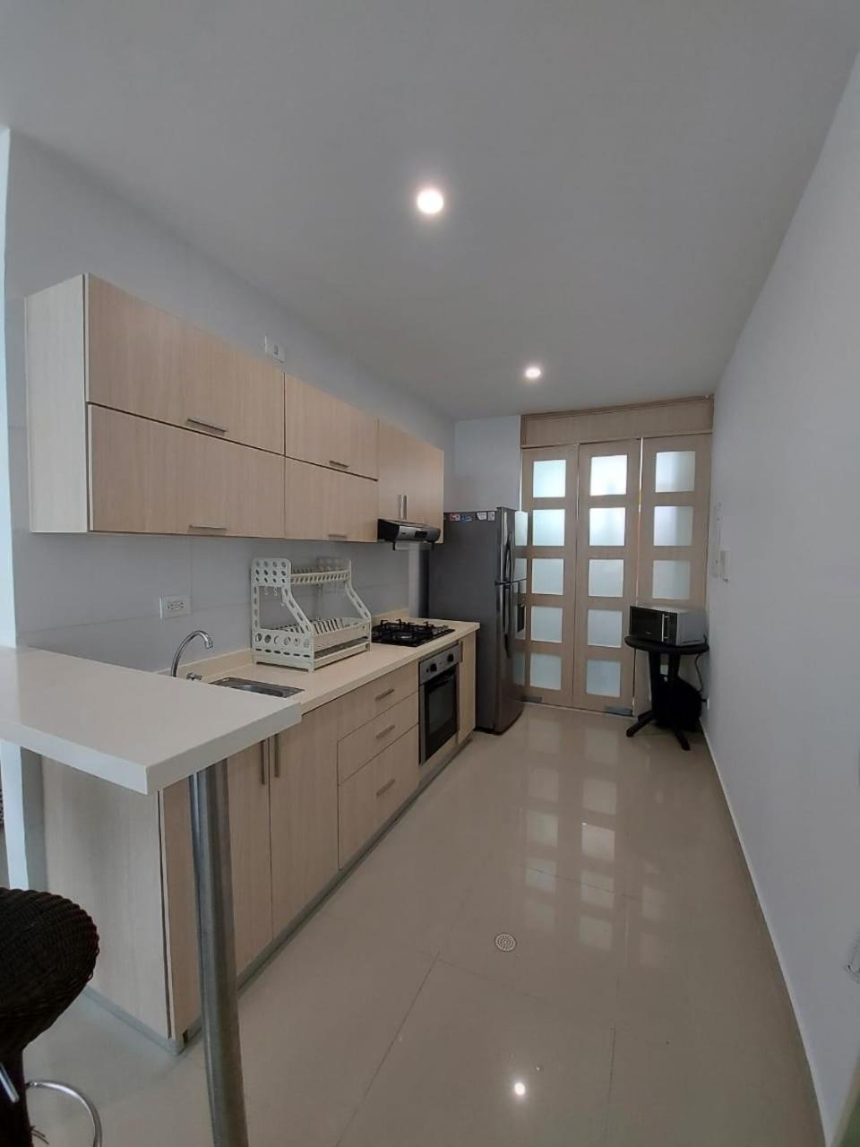 Hermoso apartamento con piscina frente al mar - Primera Ensenada