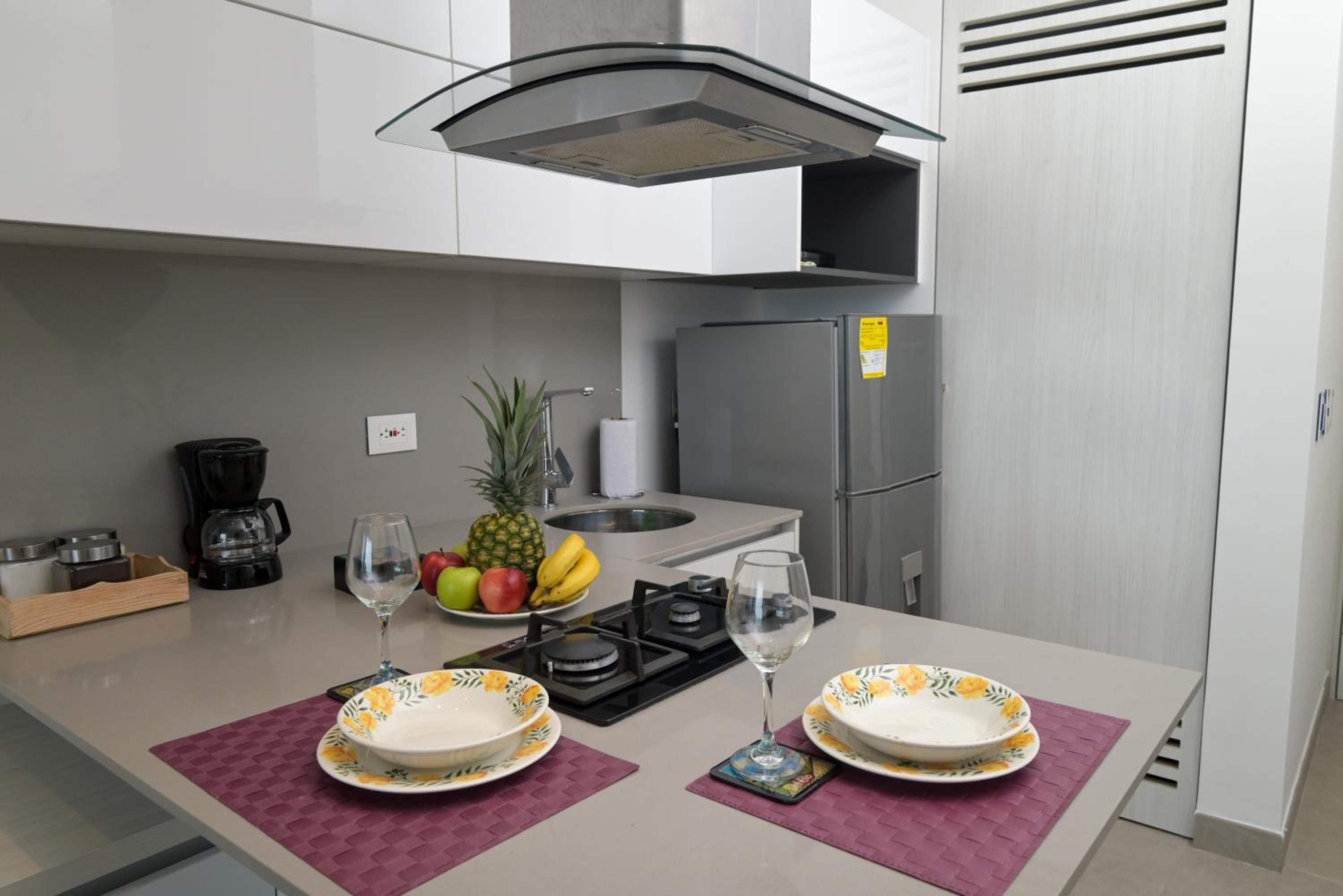 Distrito 90 - Estudios y Apartamentos para vacaciones y viajes de negocio