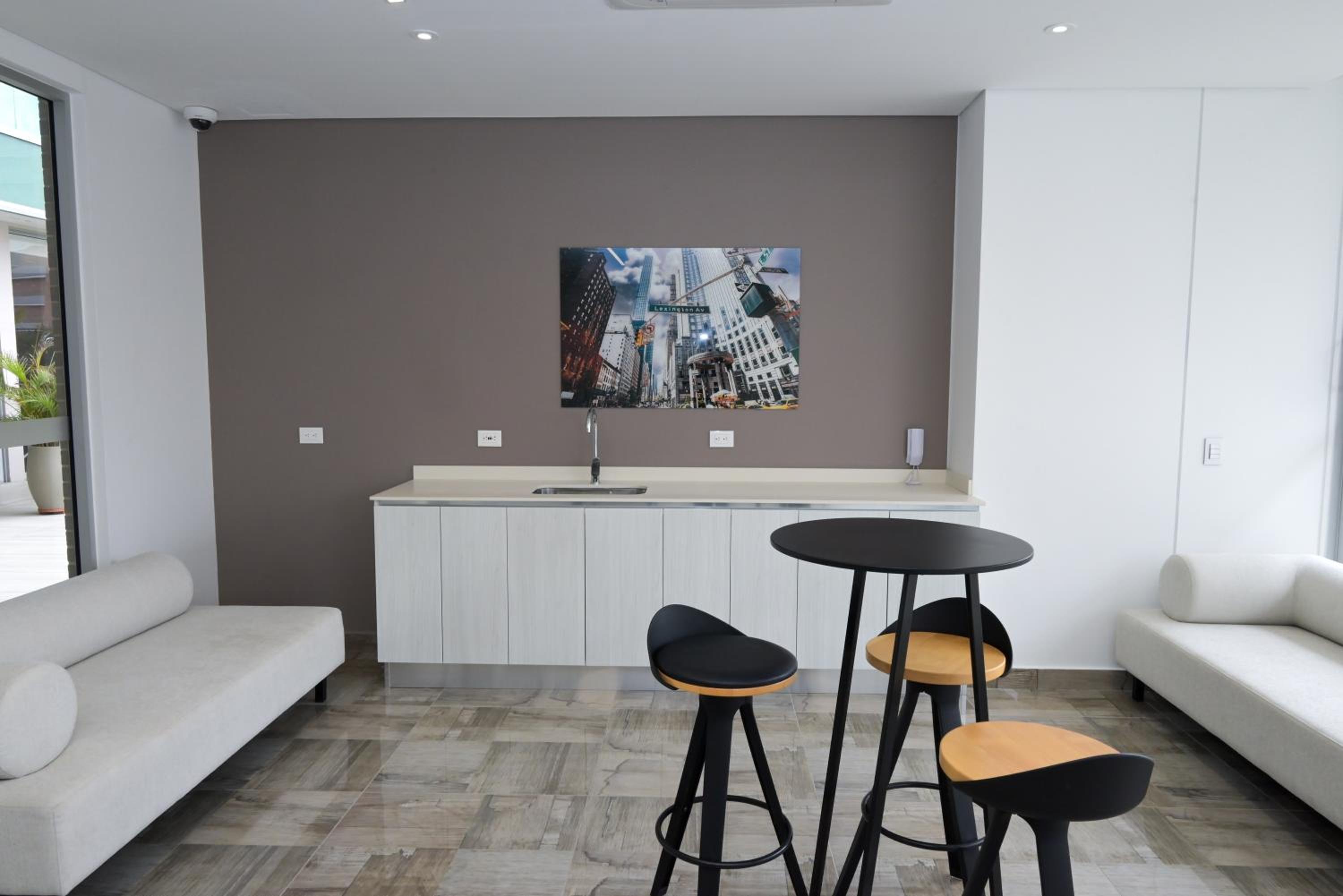 Distrito 90 - Estudios y Apartamentos para vacaciones y viajes de negocio
