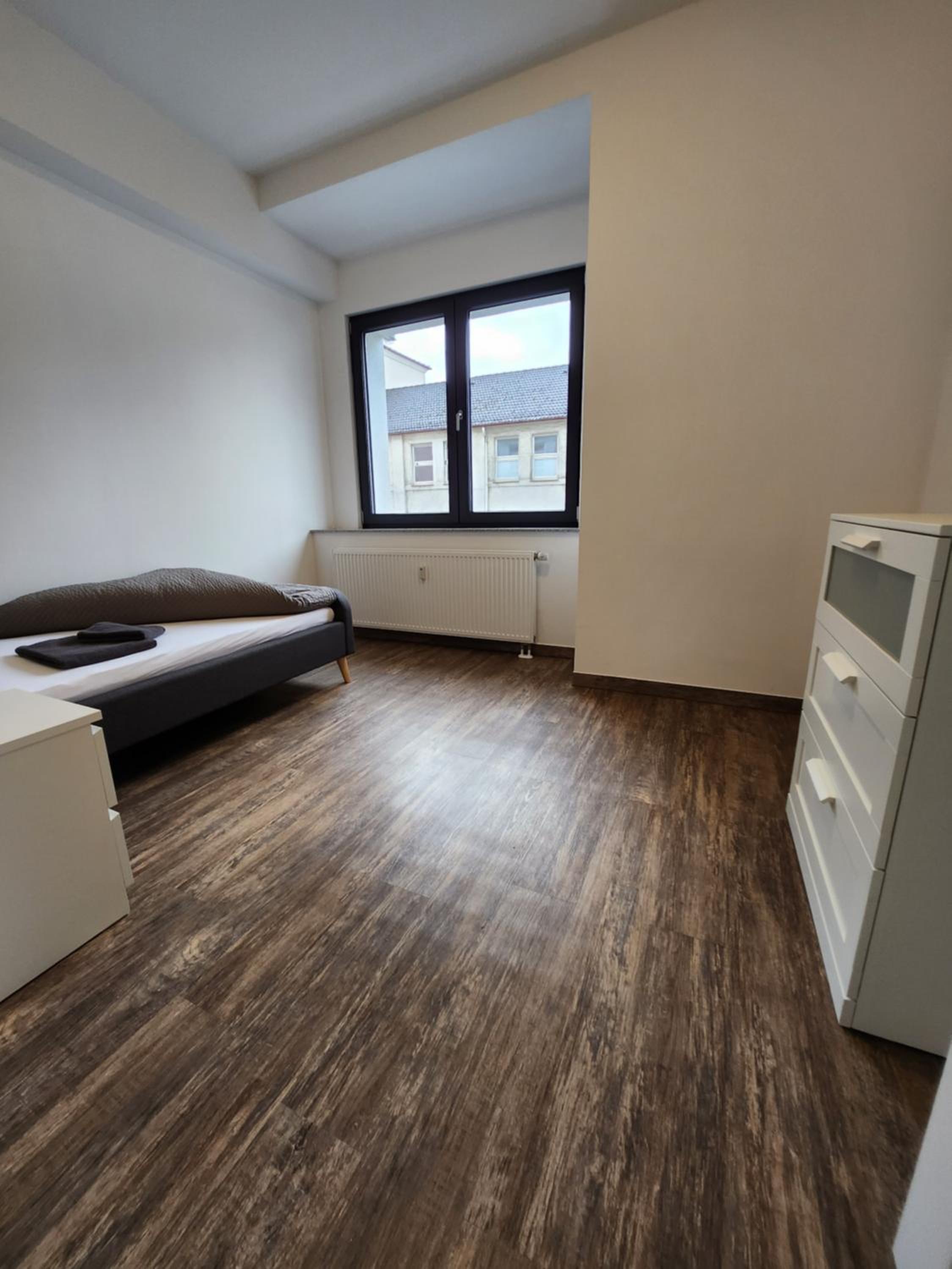 BIELEFELD CITY APARTMENTS - komfortable Einzelzimmer und Doppelzimmer - moderne Badezimmer, schnelles WLAN, Self-Check-In