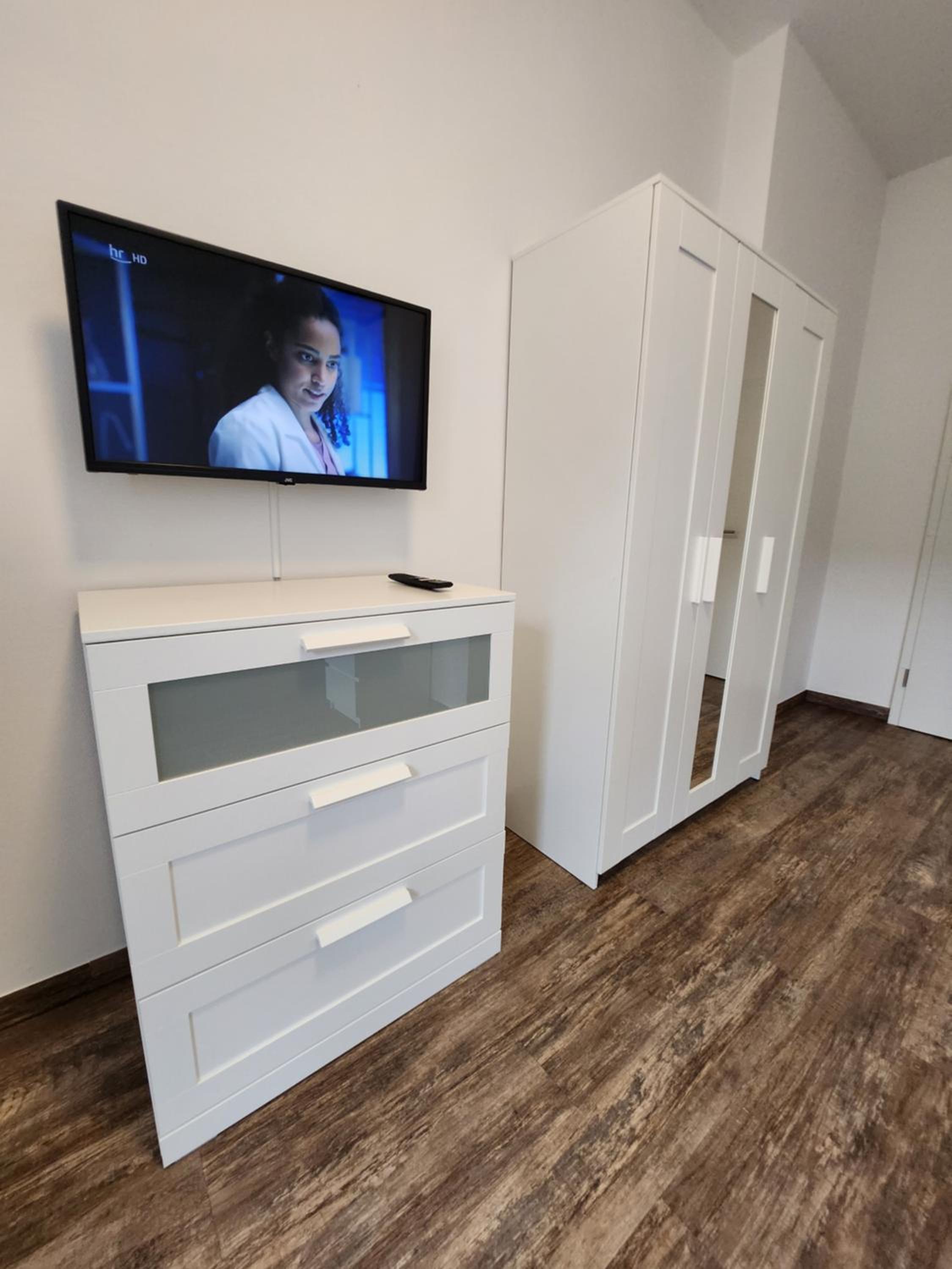 BIELEFELD CITY APARTMENTS - komfortable Einzelzimmer und Doppelzimmer - moderne Badezimmer, schnelles WLAN, Self-Check-In