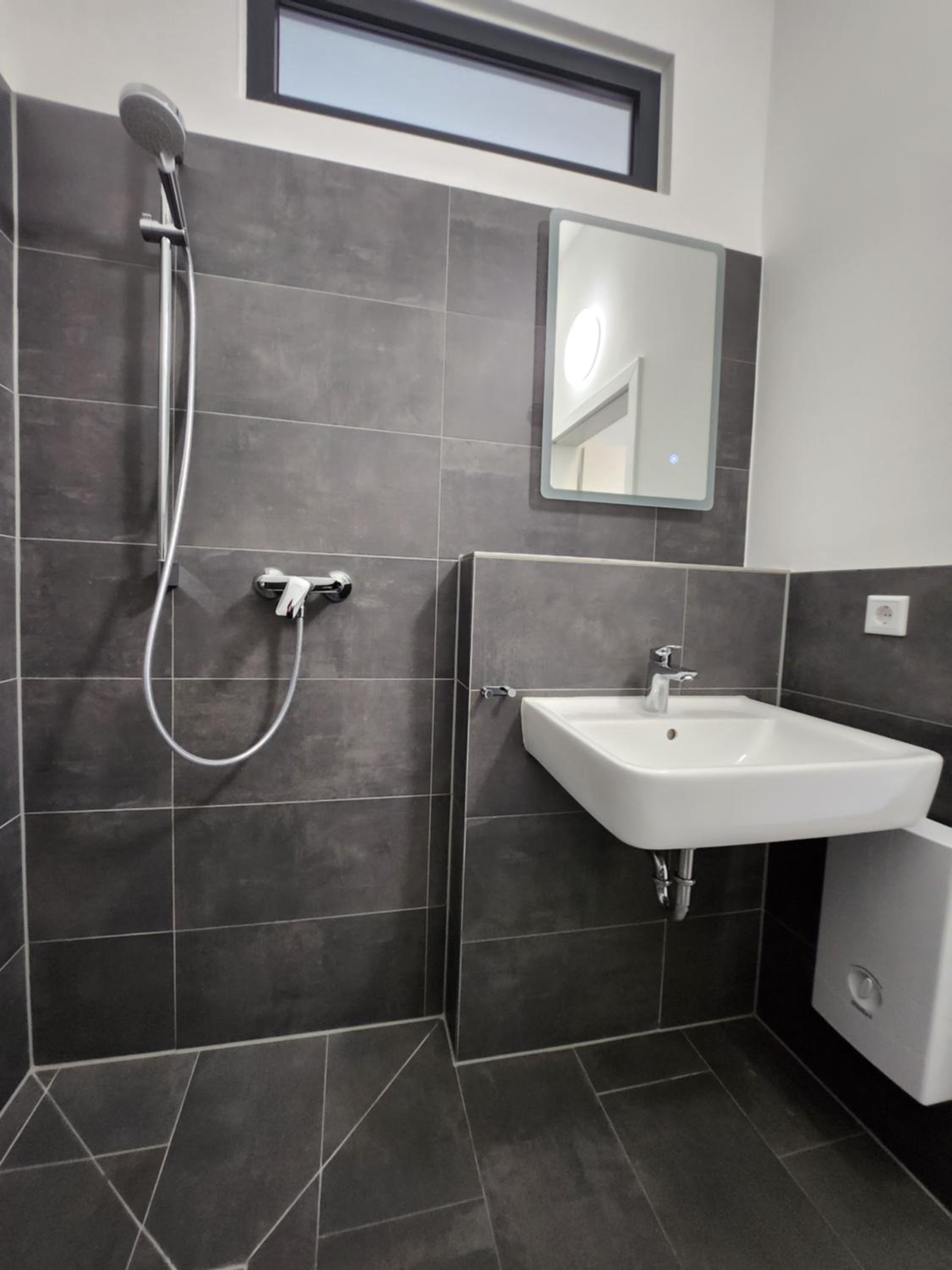 BIELEFELD CITY APARTMENTS - komfortable Einzelzimmer und Doppelzimmer - moderne Badezimmer, schnelles WLAN, Self-Check-In