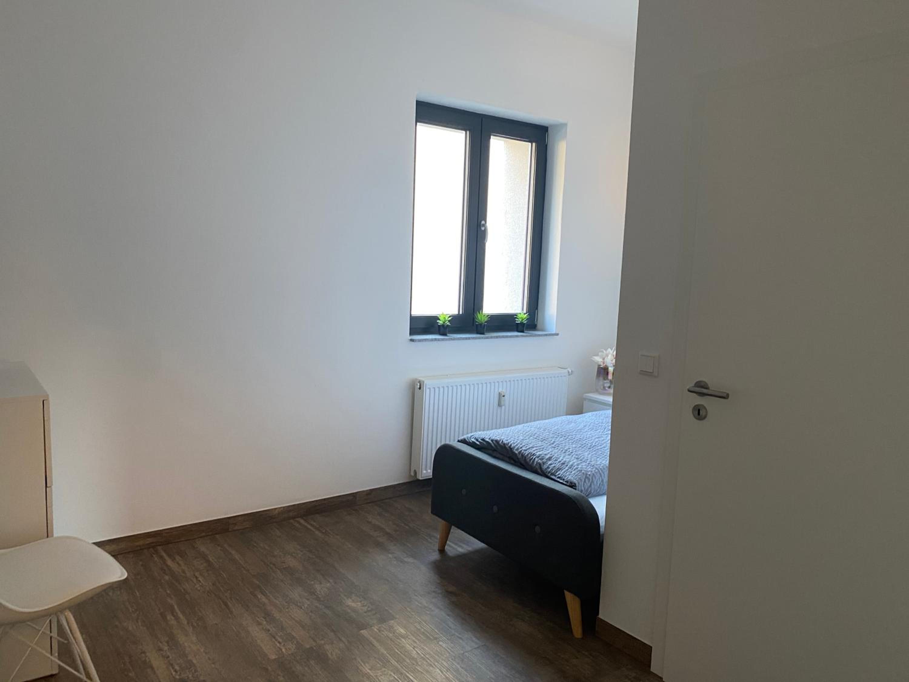 BIELEFELD CITY APARTMENTS - komfortable Einzelzimmer und Doppelzimmer - moderne Badezimmer, schnelles WLAN, Self-Check-In